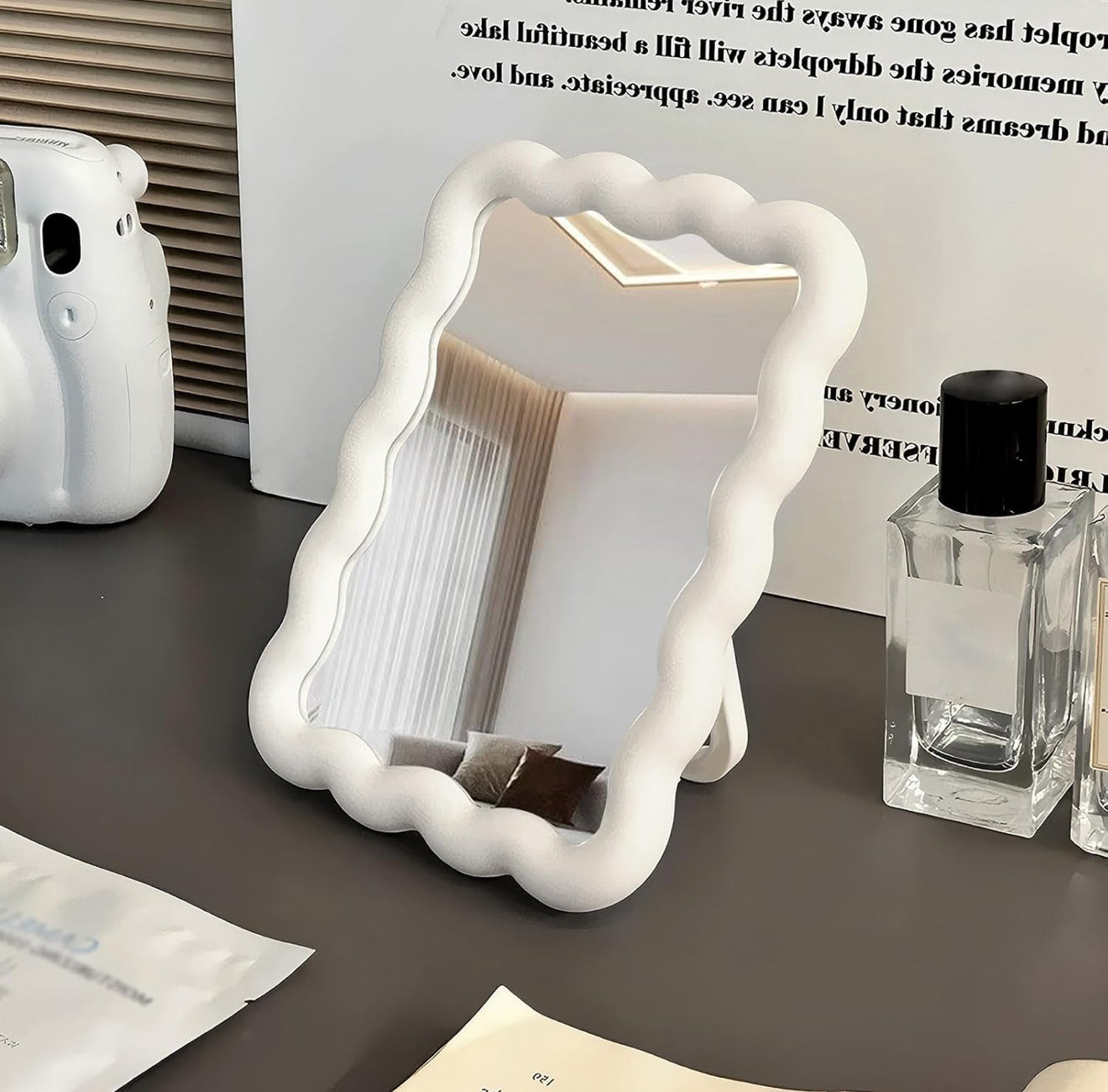 Wave shaped table mirror